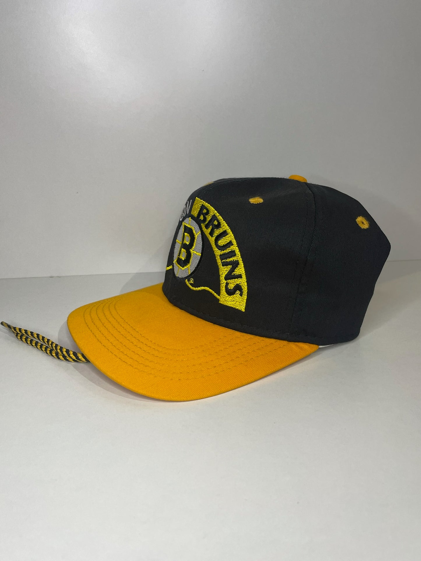 VINTAGE 90s BOSTON BRUINS #1 APPAREL DRAWSTRING CAP HAT