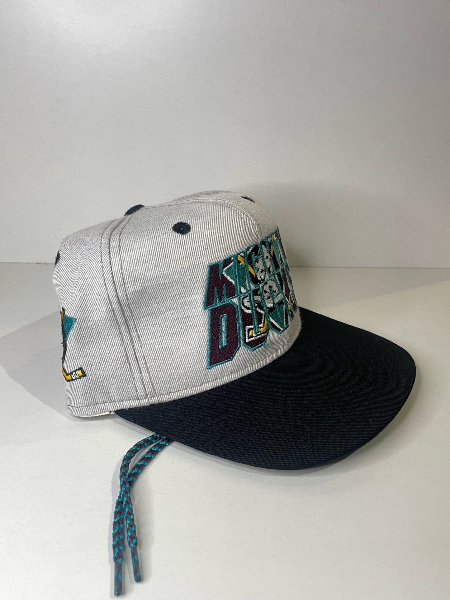 VINTAGE 90s MIGHTY DUCKS #1 APPAREL DRAWSTRING CAP HAT