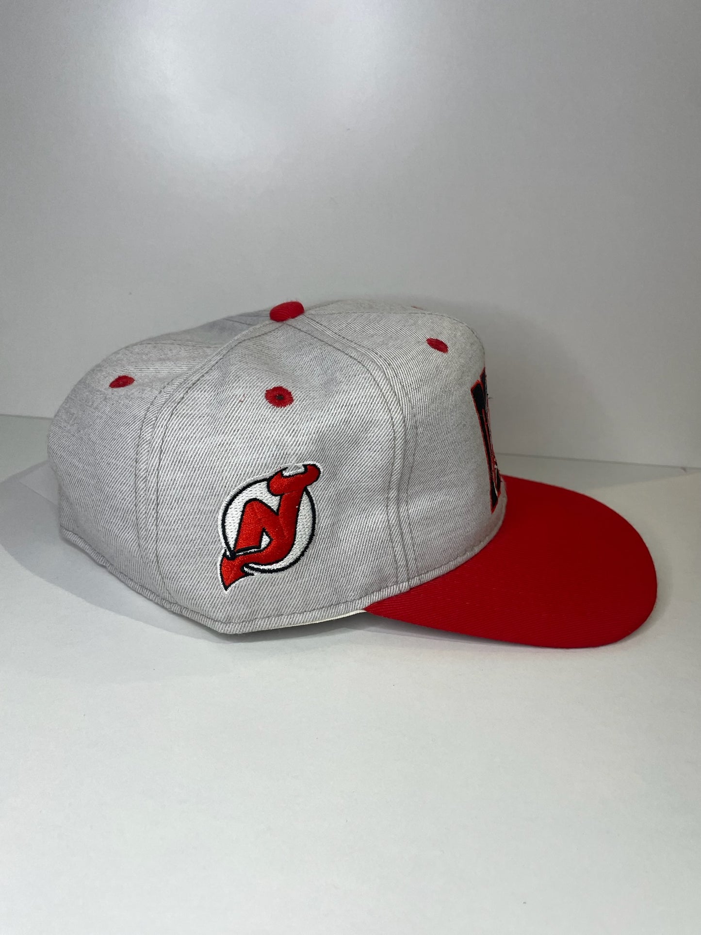 VINTAGE 90s NEW JERSEY DEVILS #1 APPAREL DRAWSTRING CAP HAT