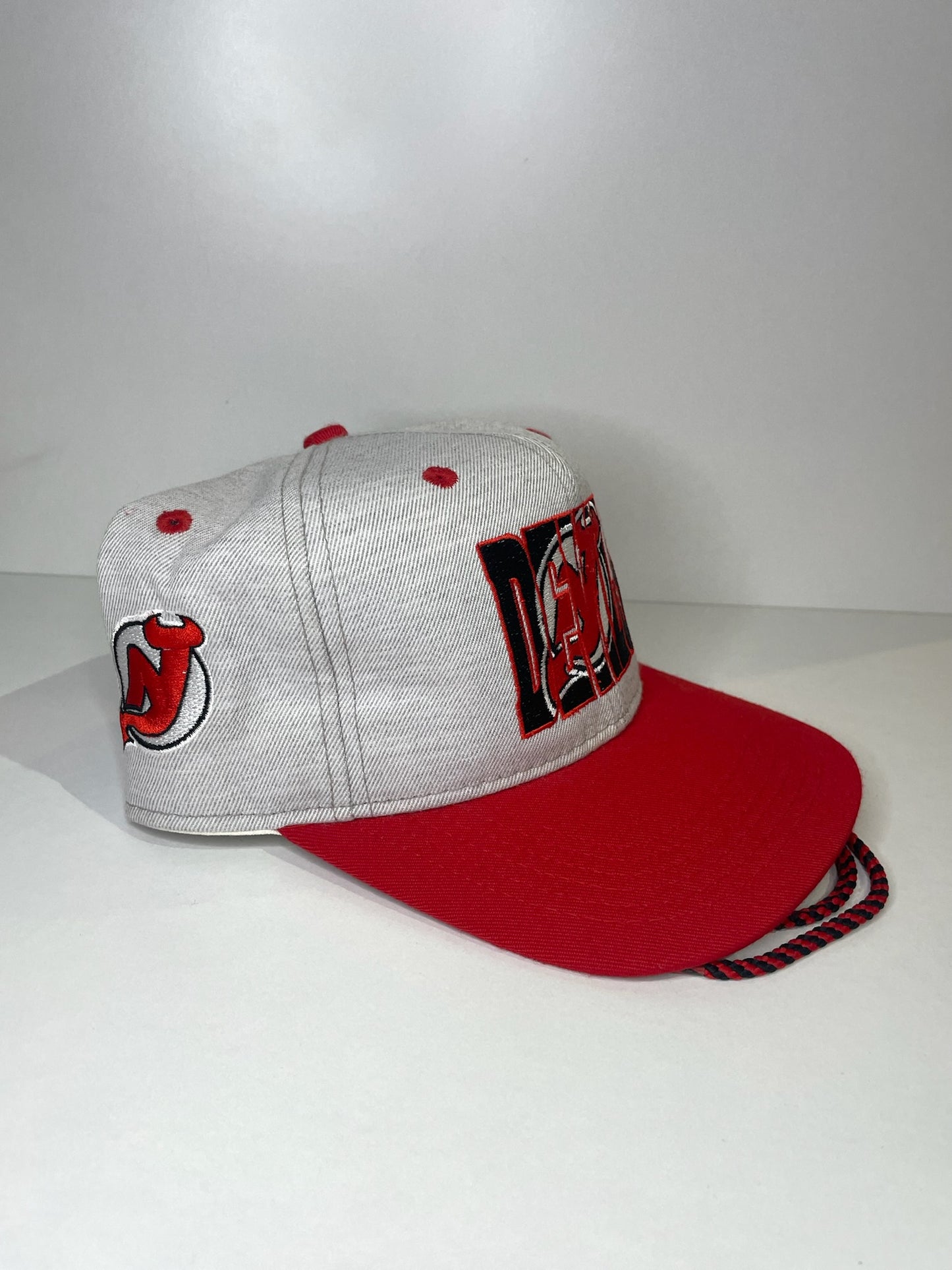 VINTAGE 90s NEW JERSEY DEVILS #1 APPAREL DRAWSTRING CAP HAT