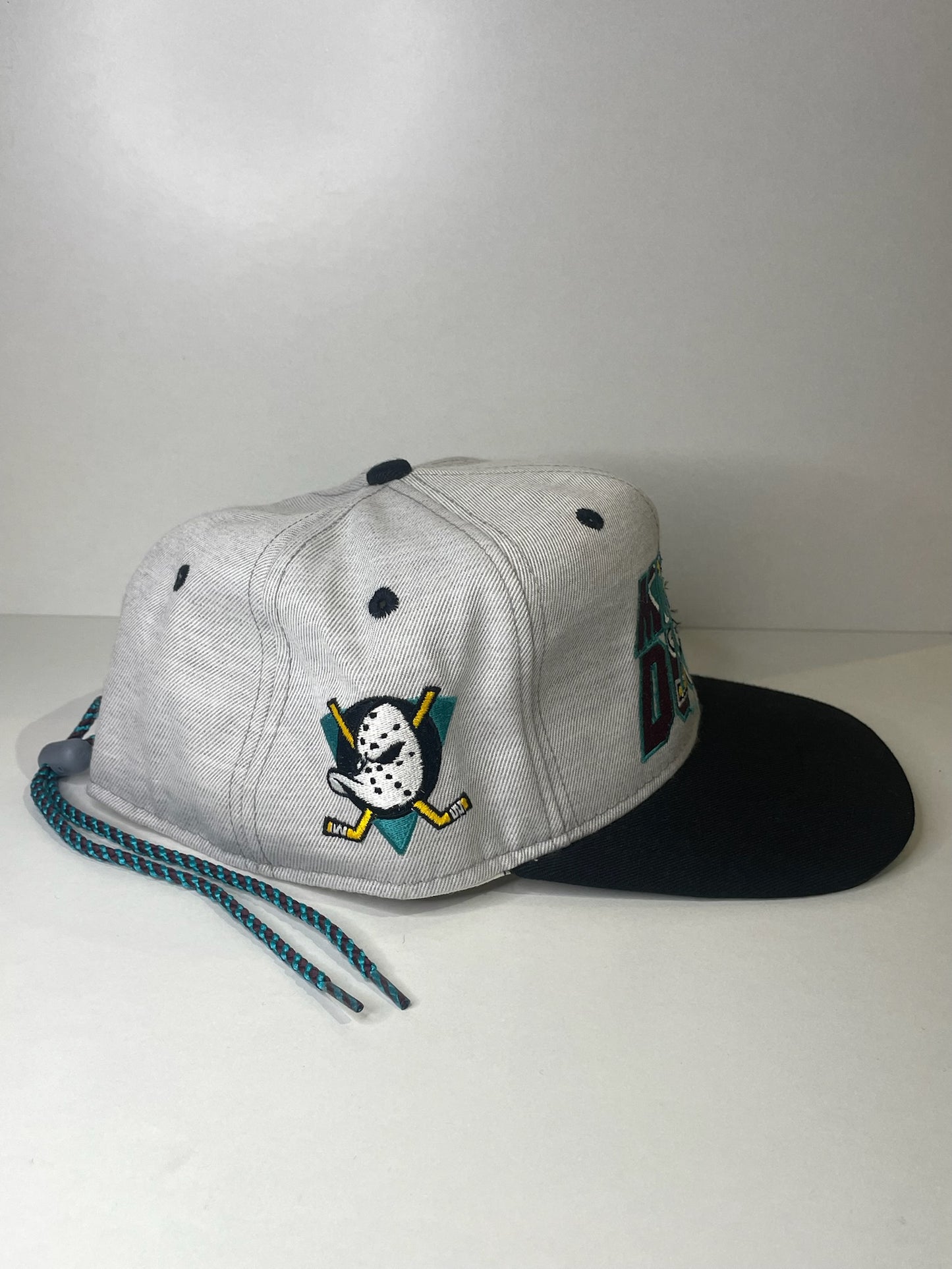 VINTAGE 90s MIGHTY DUCKS #1 APPAREL DRAWSTRING CAP HAT