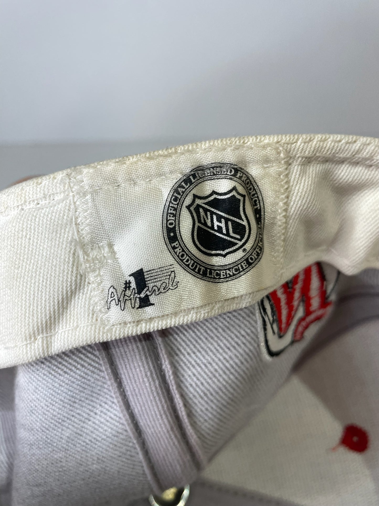 VINTAGE 90s NEW JERSEY DEVILS #1 APPAREL DRAWSTRING CAP HAT