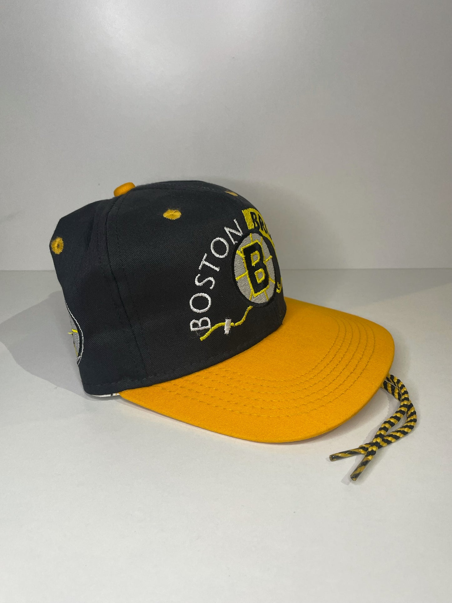 VINTAGE 90s BOSTON BRUINS #1 APPAREL DRAWSTRING CAP HAT