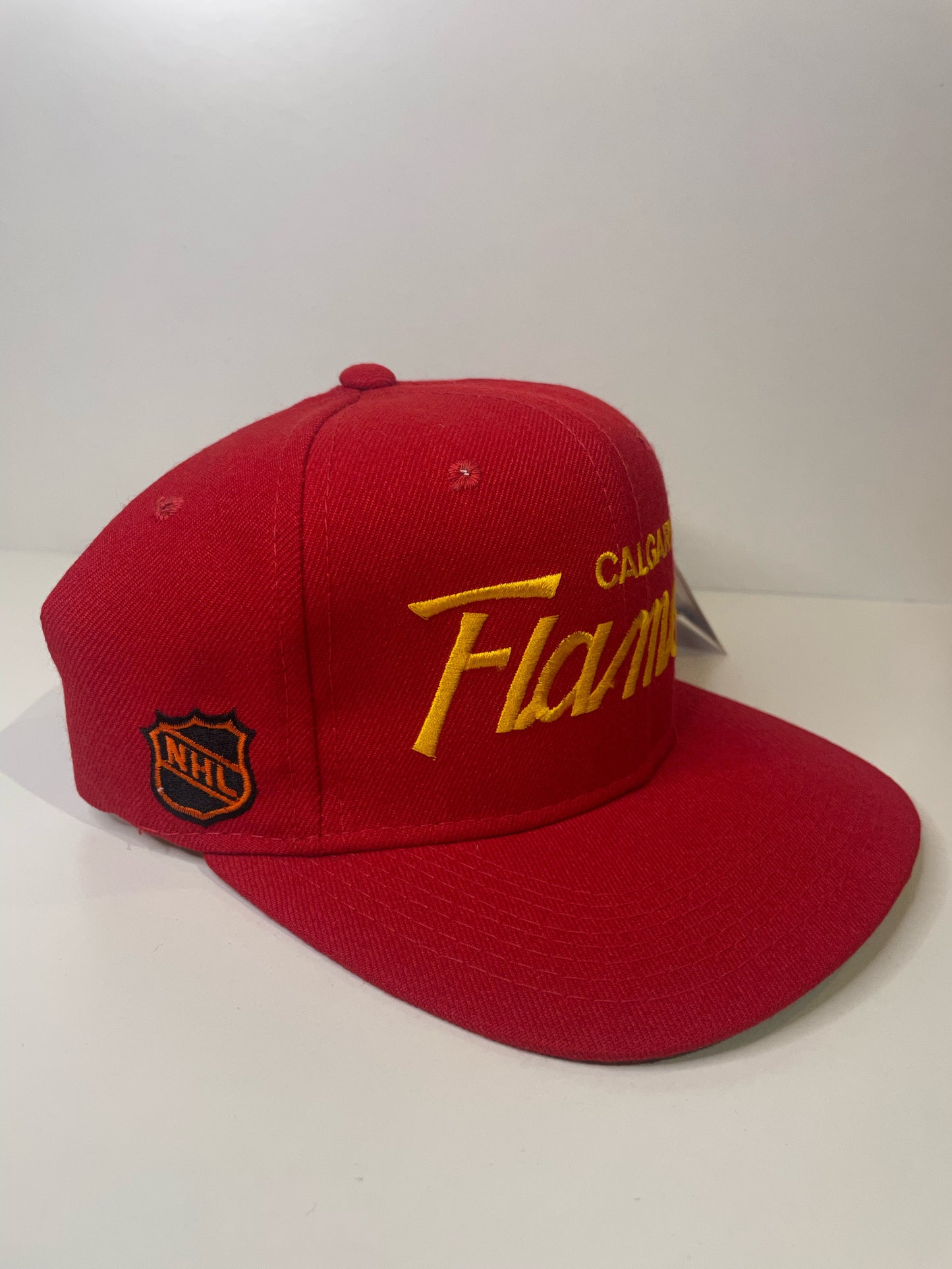 "DS" VINTAGE 90s CALGARY FLAMES SPORTS SPECIALTIES SCRIPT SNAPBACK HAT