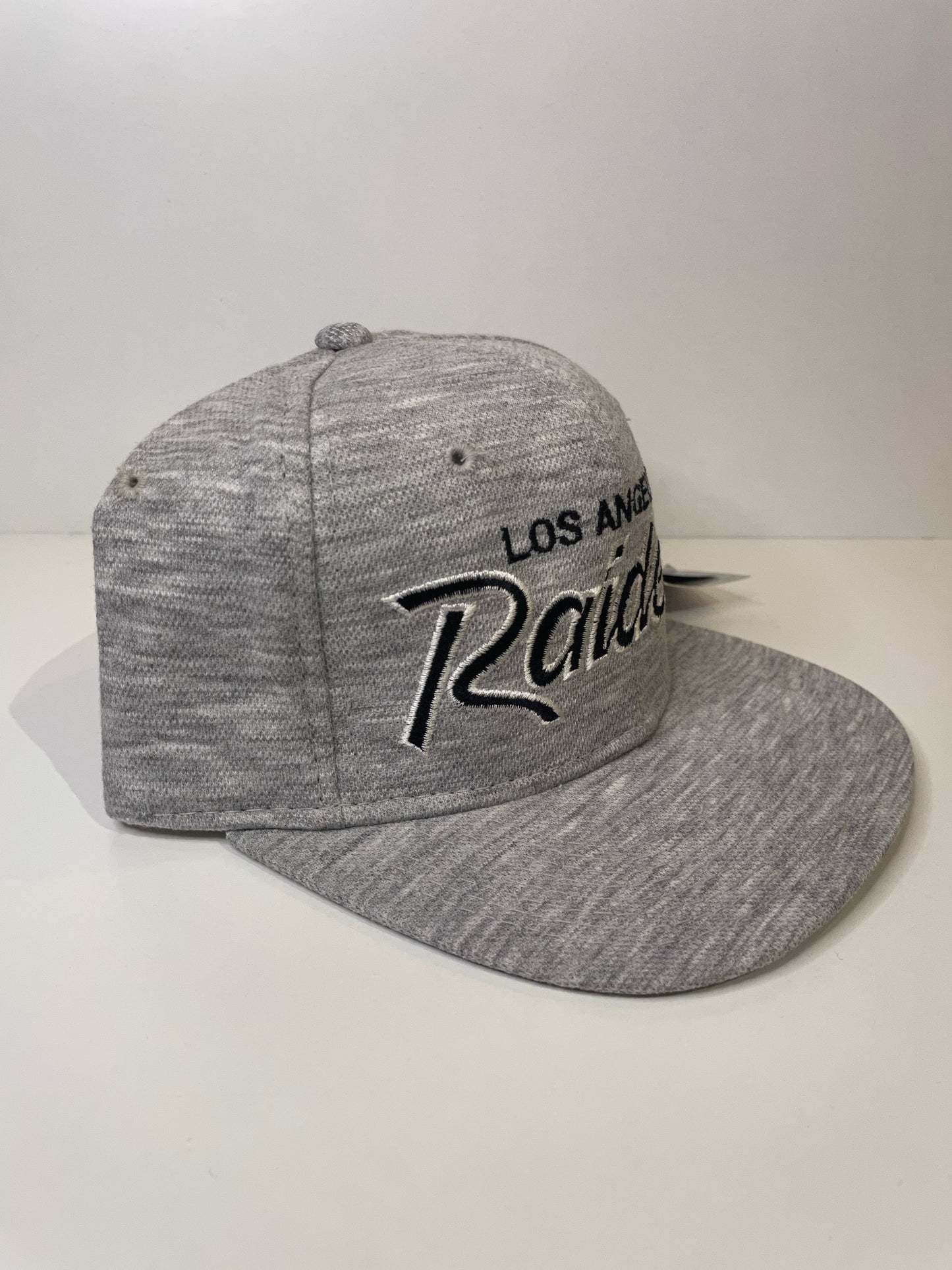 "DS" VINTAGE 90s LOS ANGELES RAIDERS SPORTS SPECIALTIES SCRIPT SNAPBACK HAT