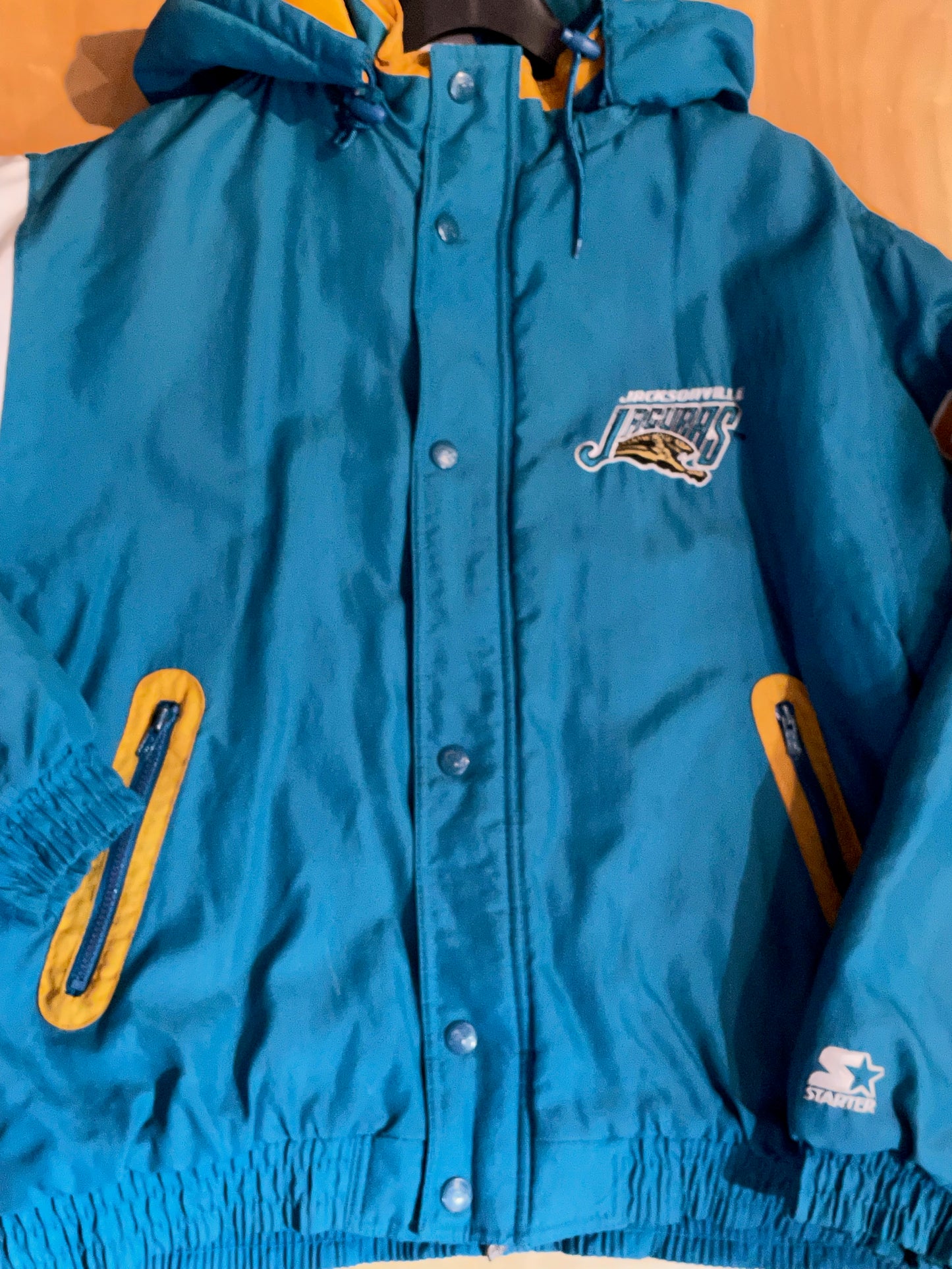 VINTAGE STARTER JACKSONVILLE JAGUARS NFL PUFFER JACKET  SZ: L