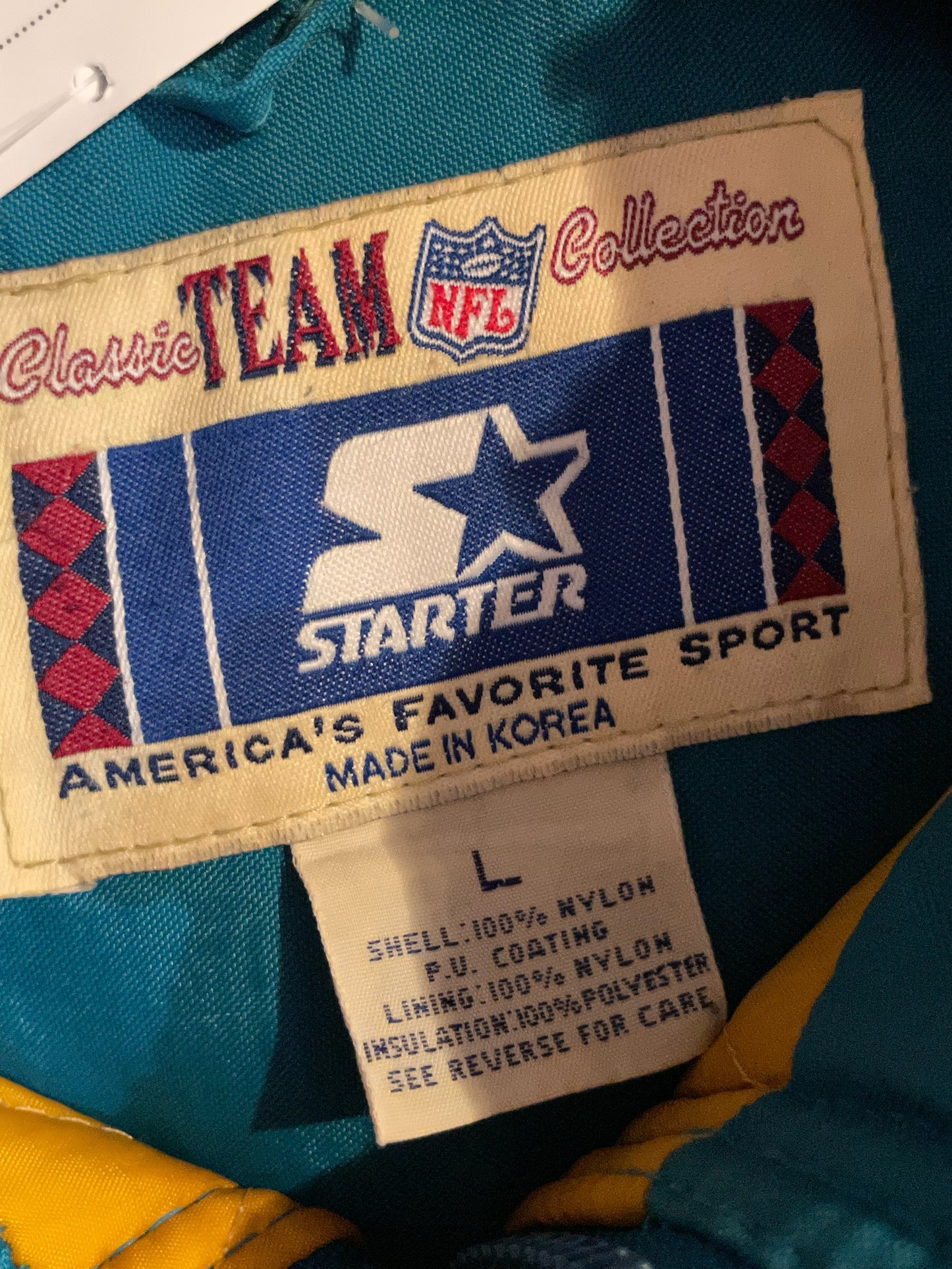 VINTAGE STARTER JACKSONVILLE JAGUARS NFL PUFFER JACKET  SZ: L