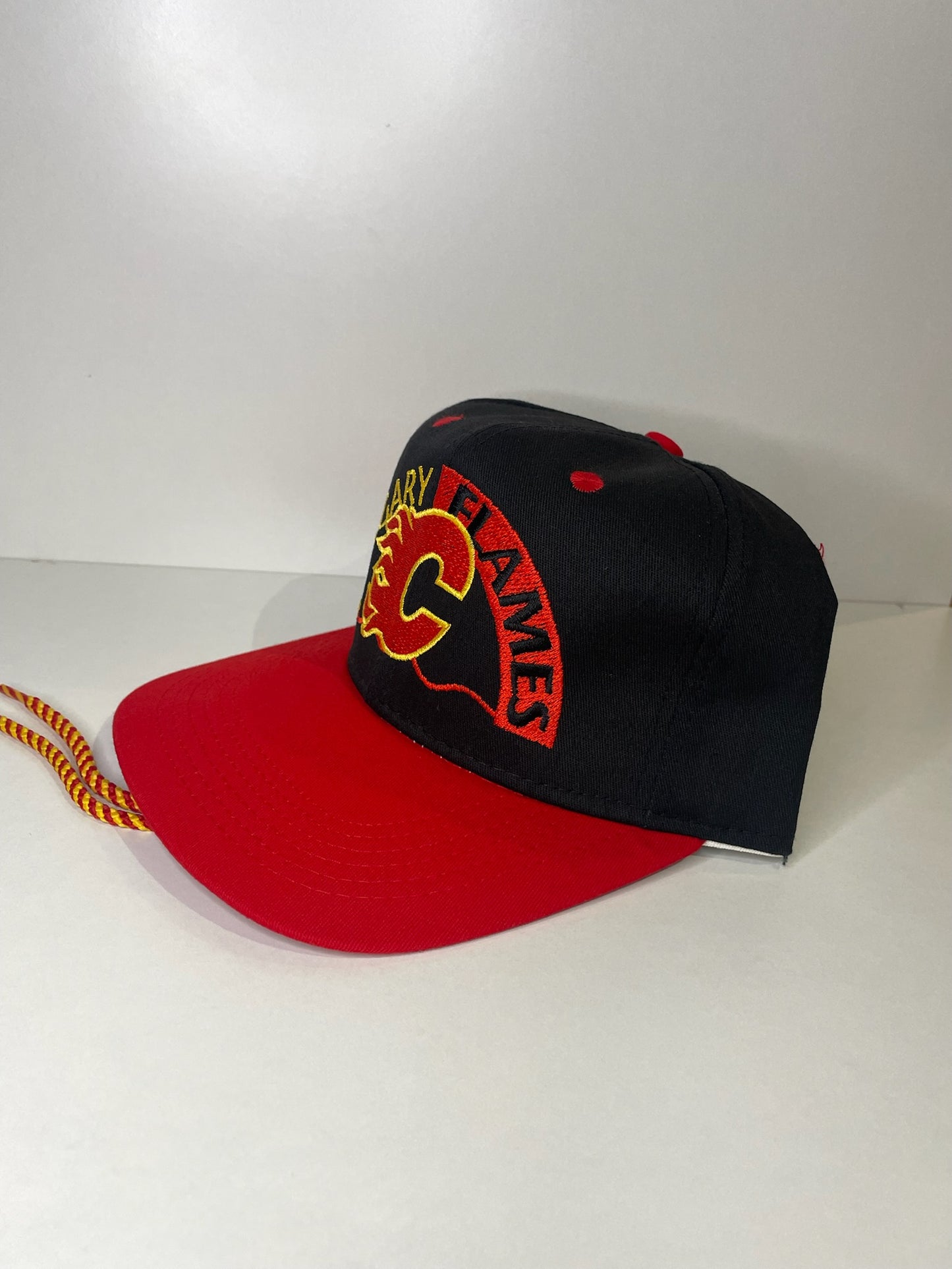 VINTAGE 90s CALGARY FLAMES #1 APPAREL DRAWSTRING CAP HAT